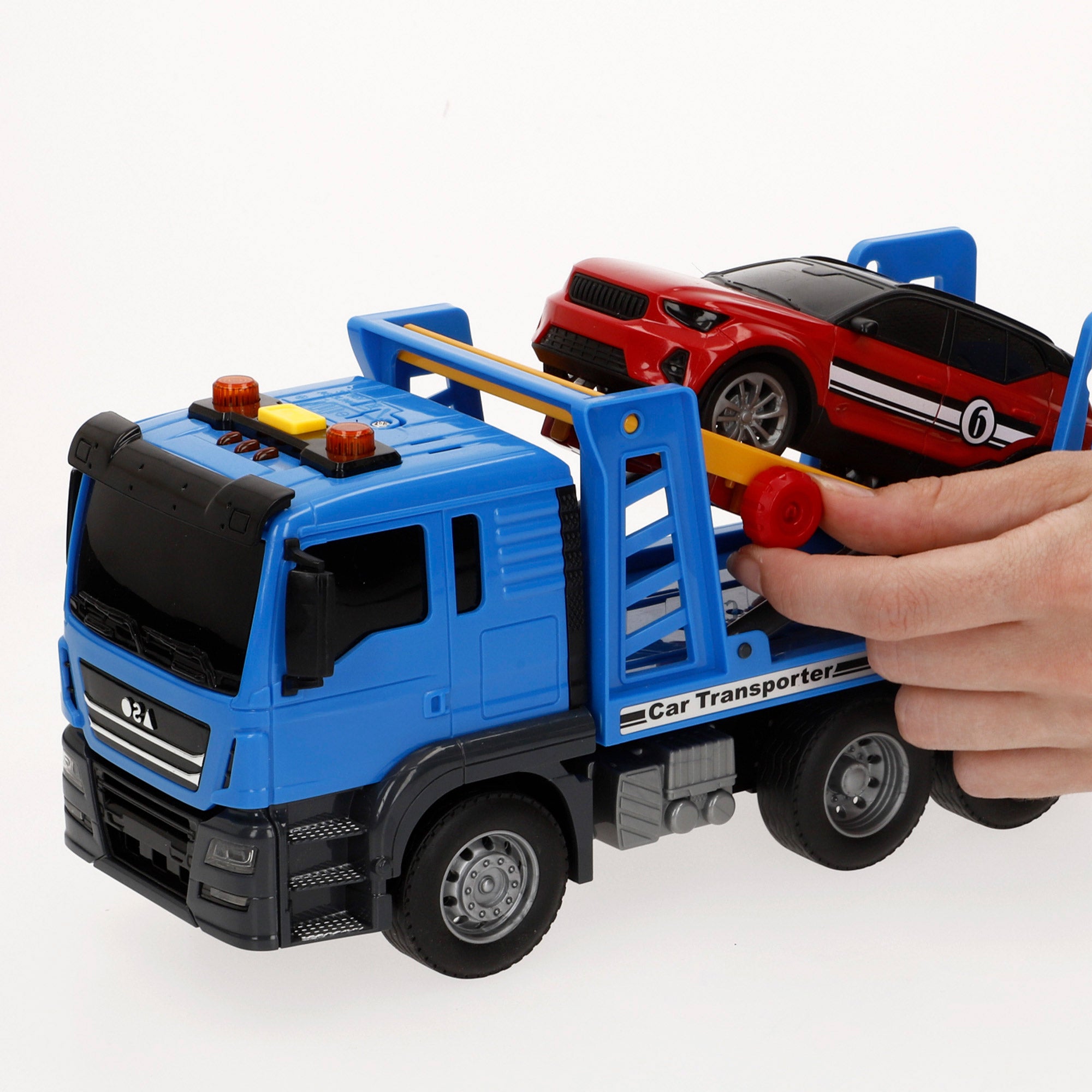 Camião transportador de automóveis Speed ​​​​&amp; Go com fricção, luzes e sons, escala 1:14.