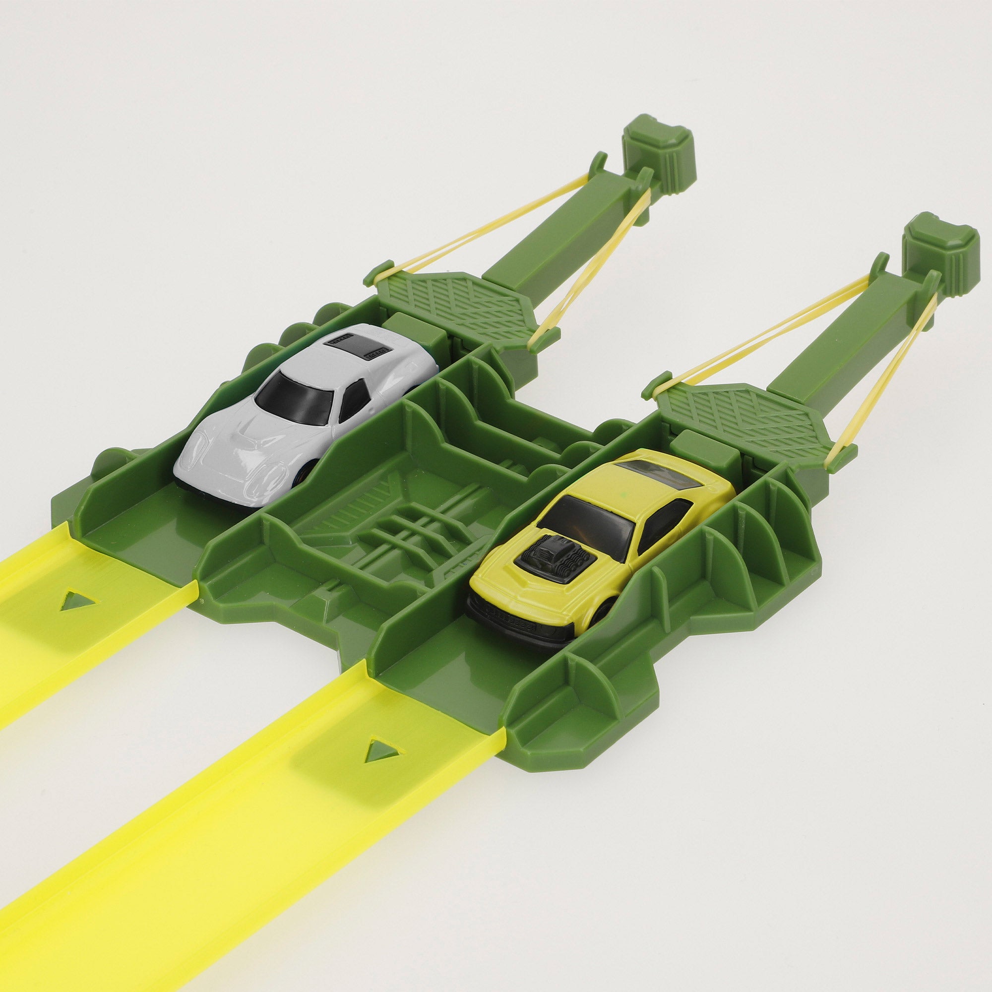 Pista de carros em forma de dinossauro com lançador duplo e dois carros Teamsterz.
