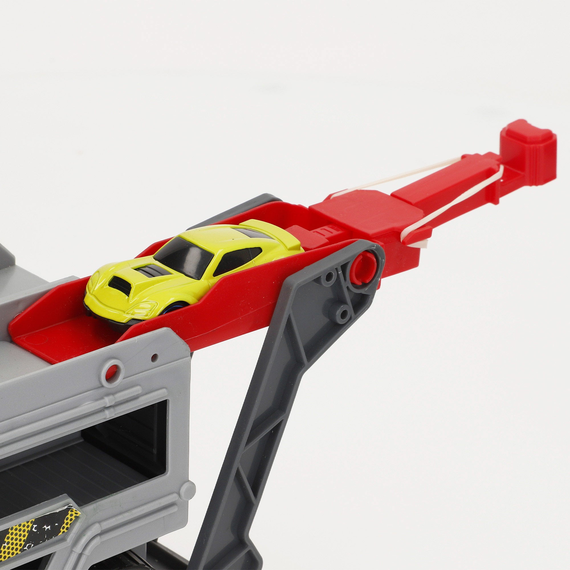 Camião lançador de carros Teamsterz com pista em loop e carro de metal