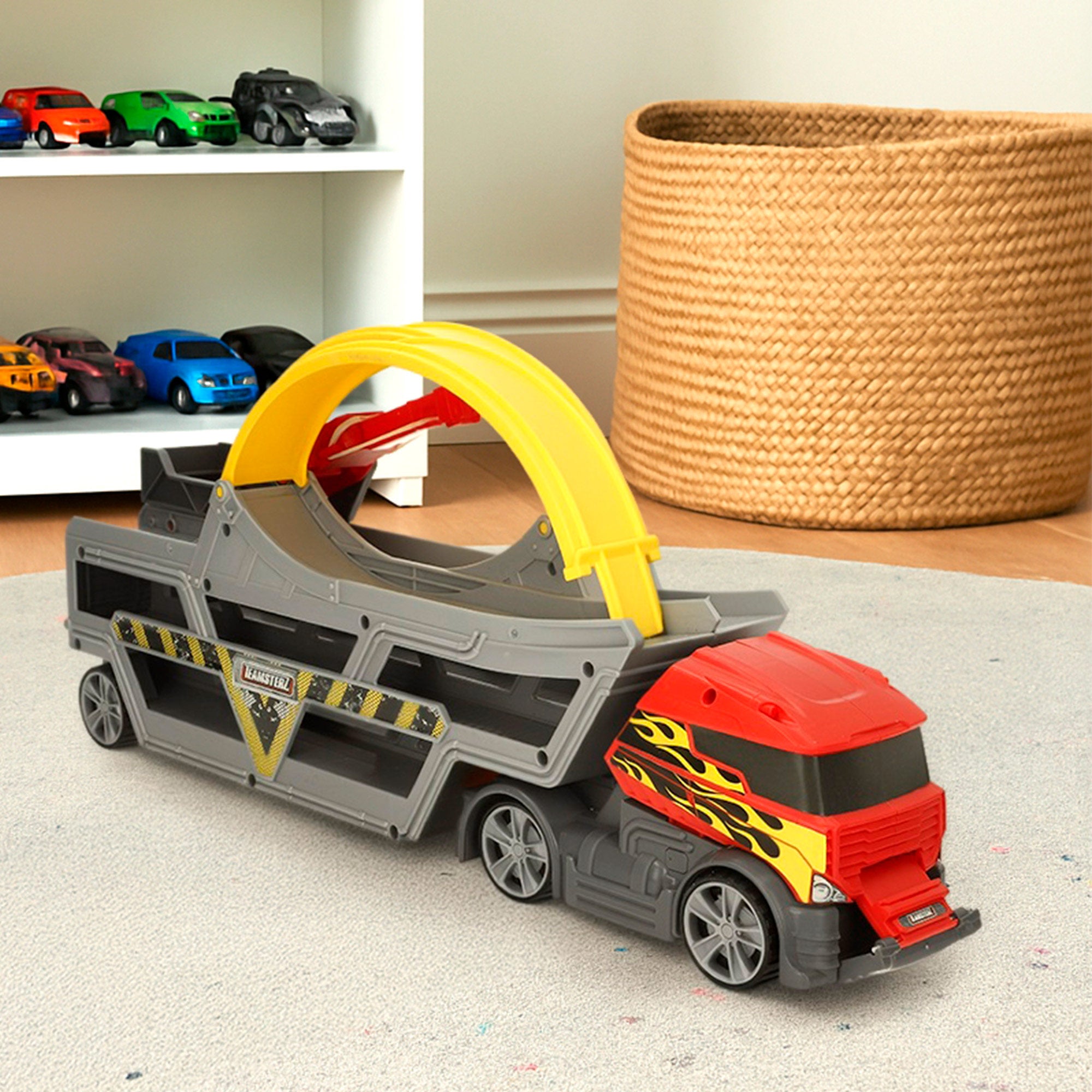 Camião lançador de carros Teamsterz com pista em loop e carro de metal