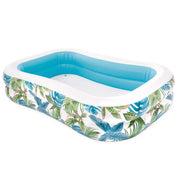 Piscina insuflável tropical INTEX com estampado de folhas e dreno.