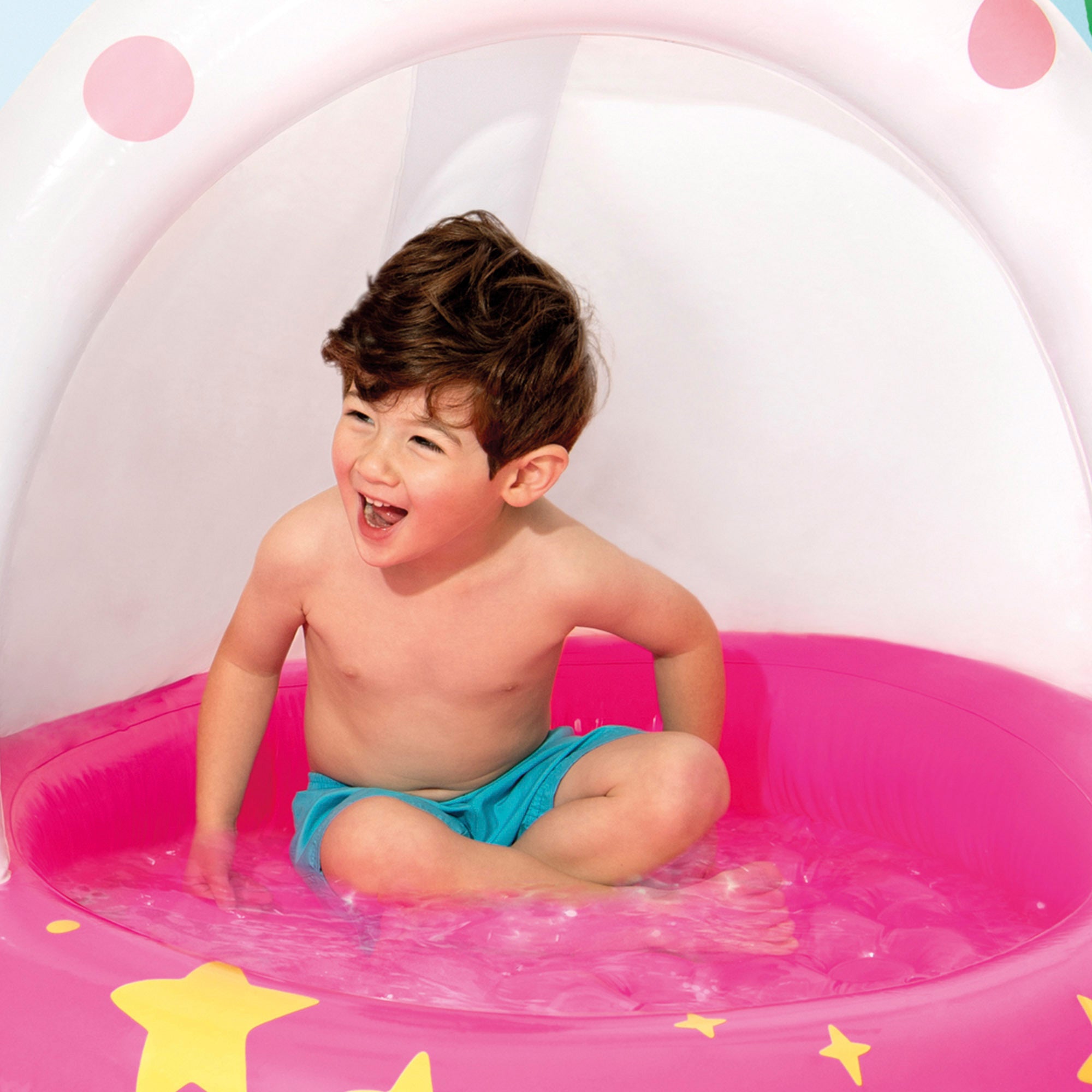 Piscina insuflável INTEX em forma de unicórnio com cobertura e piso almofadado.