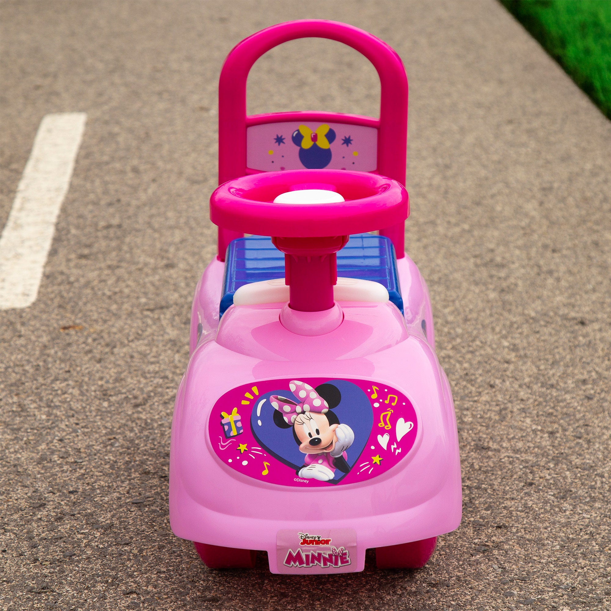 Brinquedo de encaixe da Minnie Mouse com telefone, buzina e compartimento para guardar coisas.